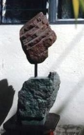 Escultura de fósiles y molejón